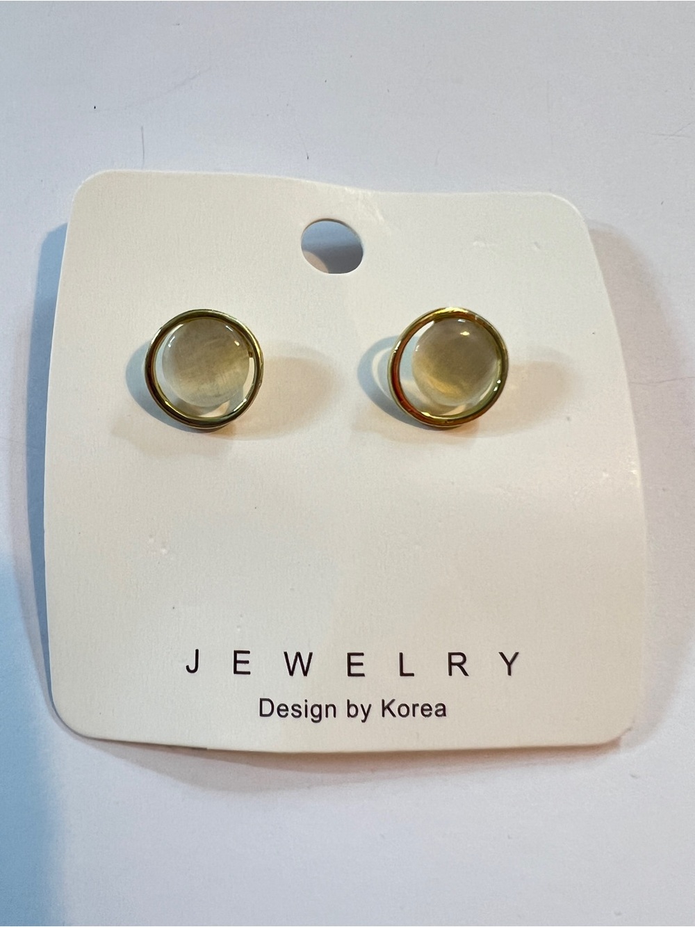 1/2” Faux Mother Of Pearl With Gold Ring Around It